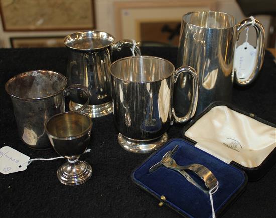 Four silver mugs, silver egg cup and childs pusher